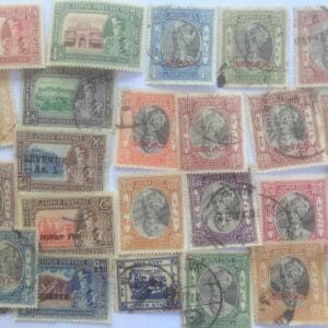 Vintage postage stamps in various colors displayed.
