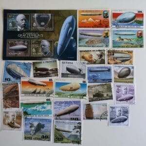 Collection of vintage Zeppelin-themed postage stamps.