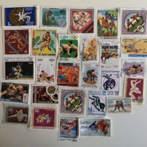 Collection of international Olympic wrestling stamps.