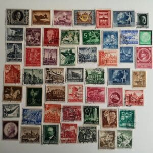 Vintage German postage stamps collection displayed.