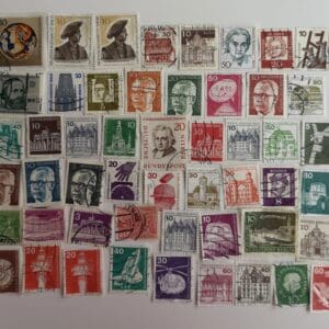 Vintage European postage stamps collection displayed.