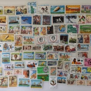 Assorted colorful postage stamps collage on white