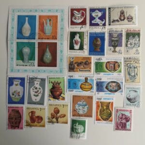 Postage stamps featuring various decorative vases.
