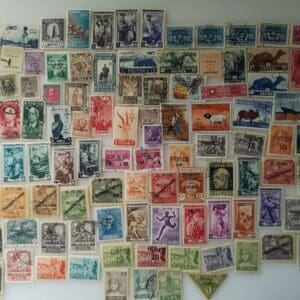 Colorful vintage postage stamp collage on white background