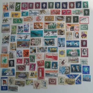 Assorted colorful international postage stamps collection.